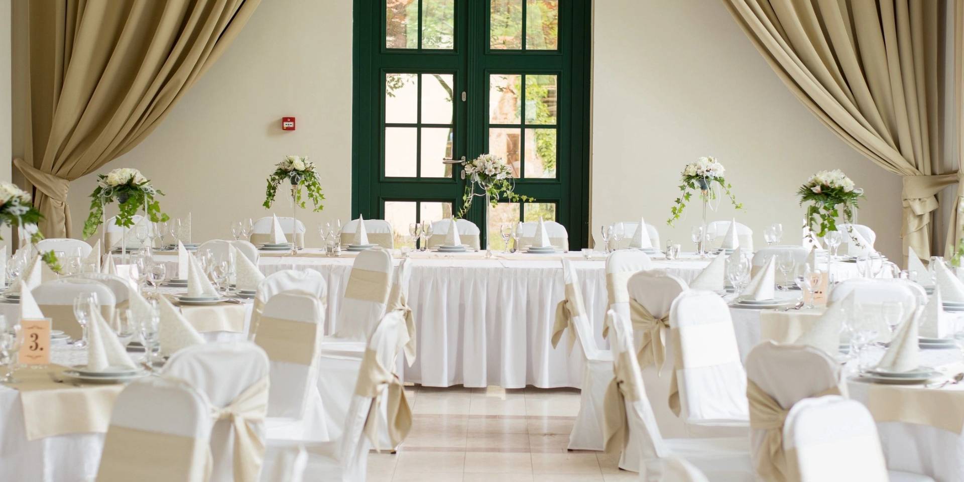 A room with many chairs and tables in it